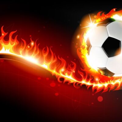 fototapeta dla dzieci przedstawiająca piłkę nożną w płomieniach na czarnym tle.