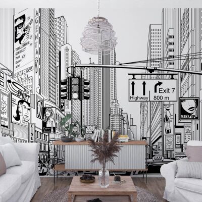 Wizualizacja jasnego, nowoczesnego salonu, w którym główną rolę odgrywa fototapeta na całej tylnej ścianie. Grafika utrzymana jest w czarno-białej kolorystyce i przypomina odręczny szkic lub rysunek komiksowy przedstawiający tętniącą życiem ulicę wielkiego miasta, wzorowaną na nowojorskim Times Square. Na tapecie widać perspektywę alei z wysokimi wieżowcami, licznymi billboardami reklamowymi, wiszącą nad ulicą sygnalizacją świetlną oraz drogowskazami