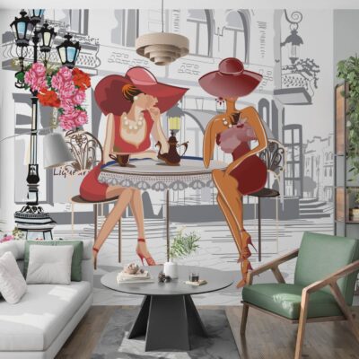 obrazek przedstawiający dwie kobiety w kapeluszach siedzące przy stoliku kawiarnianym. Za nimi kamienica i latarnia . Wszystko w stylu rysunkowym, szkic czarno biały tylko sukienki i kapelusze kobiet w kolorze czerwonym.